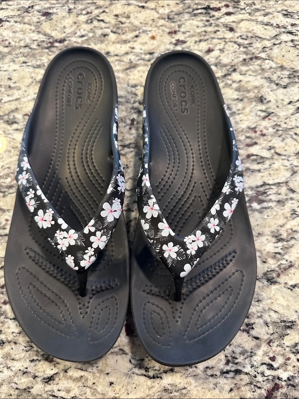 CROCS Women's Black Flip Sandals with White and Pink Floral Straps